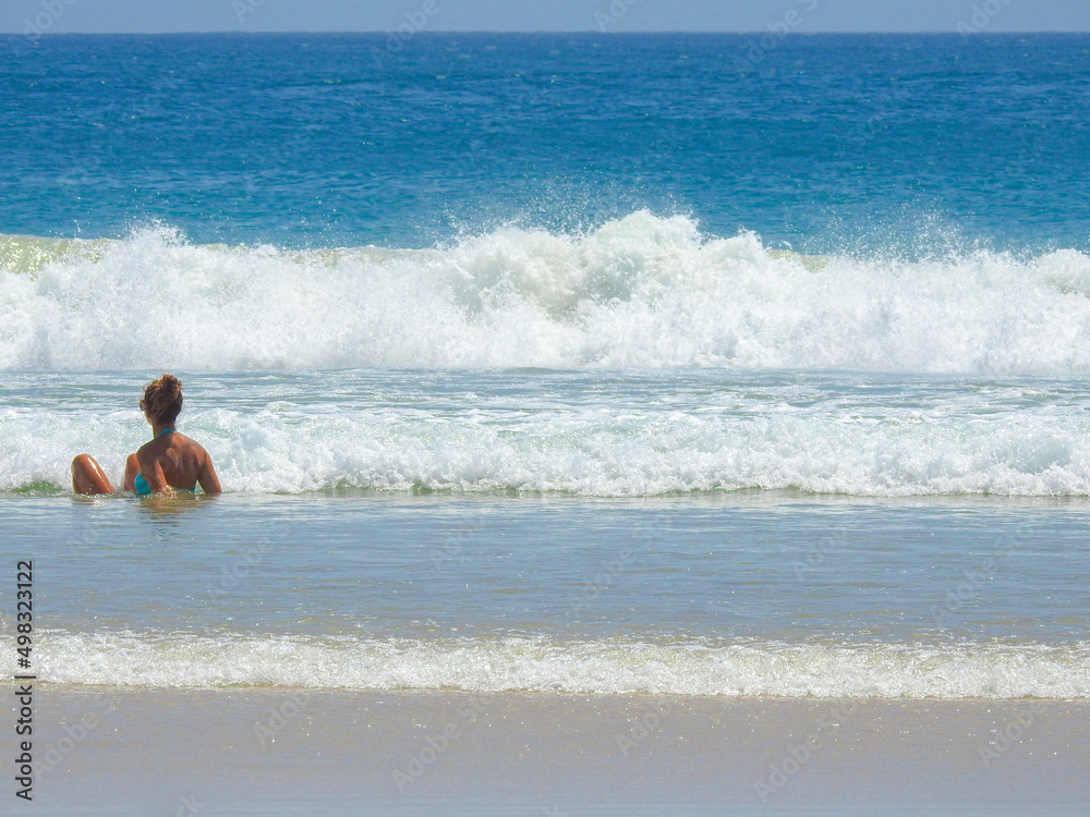 Girl Relaxing in Waves