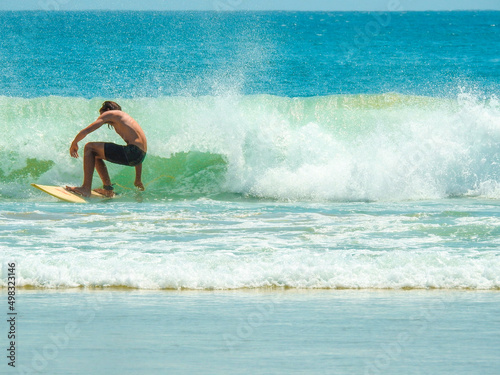 Fotografia Surfer at Clarkes Beach, Byron Bay