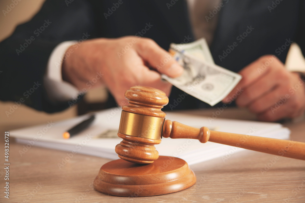 man hand money on suit pocket on grey background