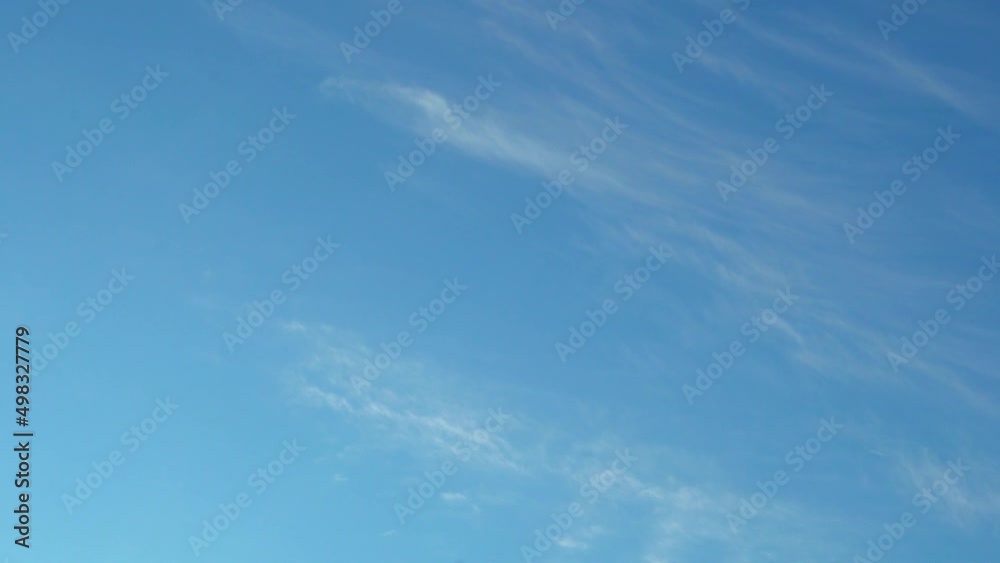 Clear Pure Blue Azure Sky, Light Cloudy on a Clear Sunny Day, Slow Motion, Relax, Beauty, Altitude, Sky High, Cirrus White Cloud in Clear Sky High. Clear Pure Blue Azure Sky, Light Cloudy on a Clear Sunny Day, Slow Motion, Relax, Beauty, Altitude, Sky High, Cirrus White Cloud in Clear Sky High.