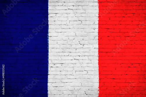 France flag painted on brick wall. National country flag background photo