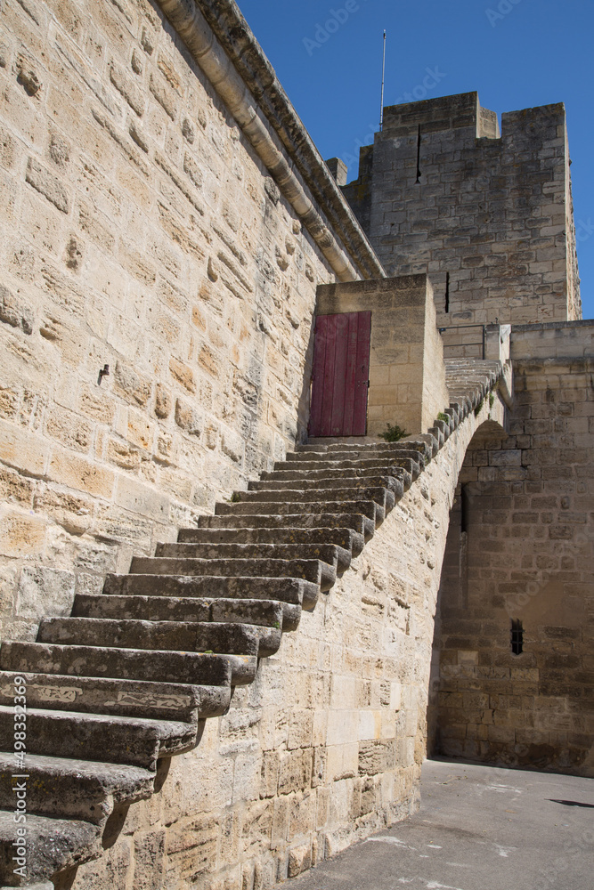 A stone stairway leading up to the city wall of the fortified medieval citadel of Aigues-Mortes, Camargue, France