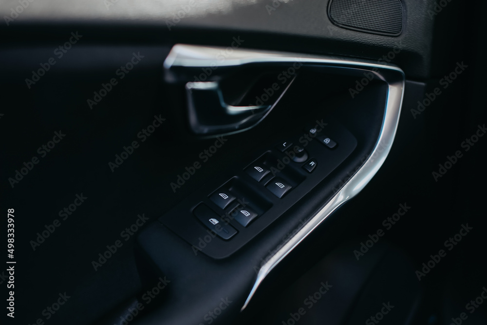 Window control buttons in car.