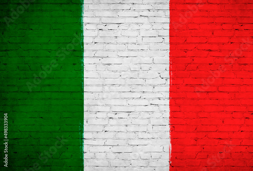 Italy flag painted on brick wall. National country flag background photo