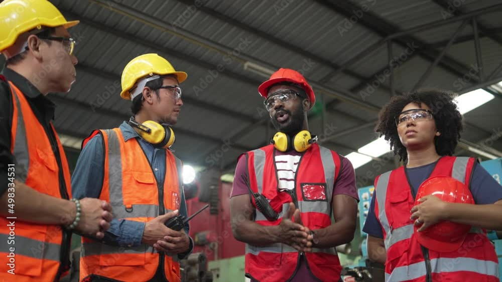 Diversity group of factory worker talking and brainstorming before working in the industry manufacturing. training trainee for industrial project. labor and construction people Diversity group of factory worker talking and brainstorming before working in the industry manufacturing. training trainee for industrial project. labor and construction people