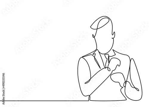 handsome businessman in a stylish luxury suit poses