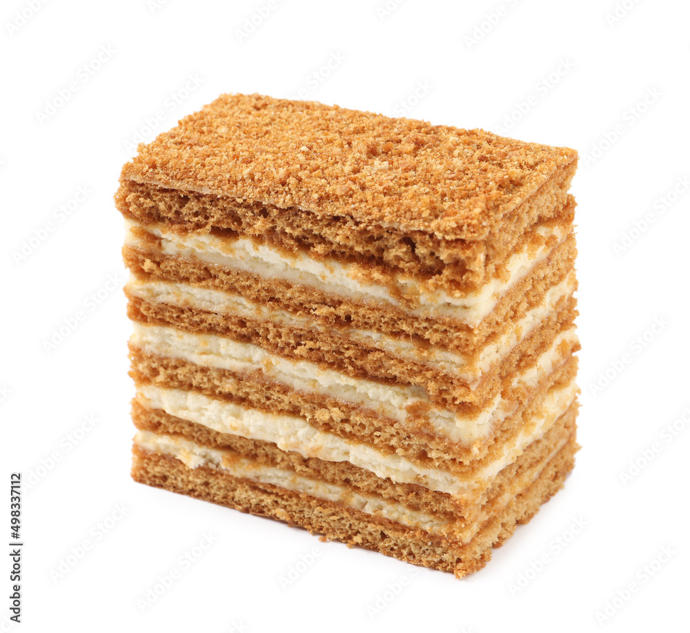 Slice of delicious layered honey cake isolated on white Slice of delicious layered honey cake isolated on white