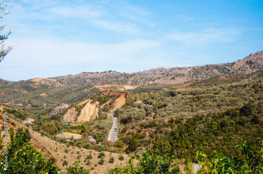 Landscape with roads among green hills, Crete.