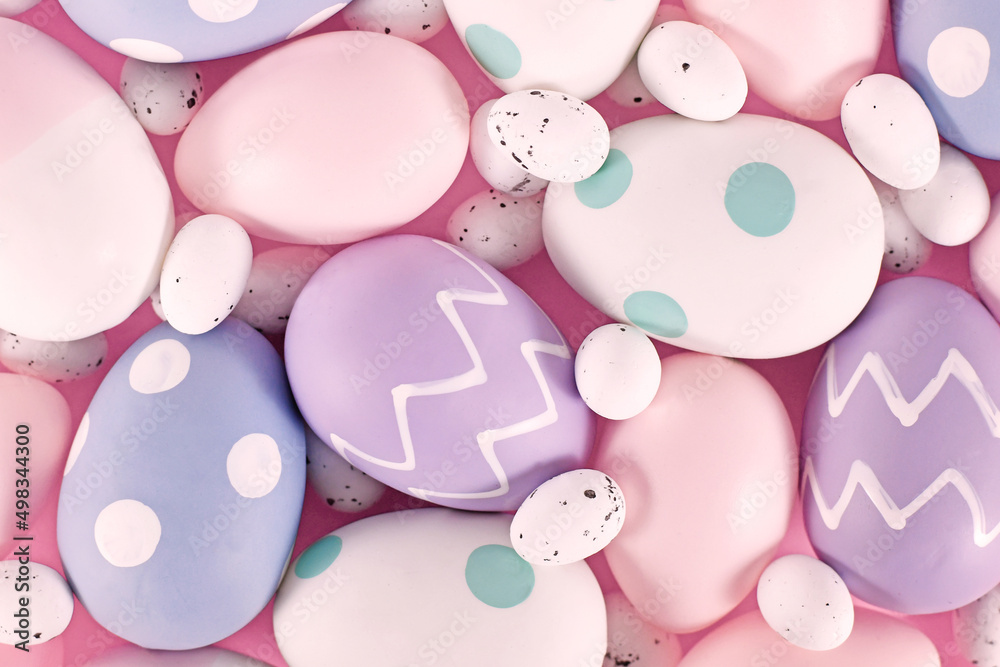 Group of pastel colored easter eggs on pink background Group of pastel colored easter eggs on pink background