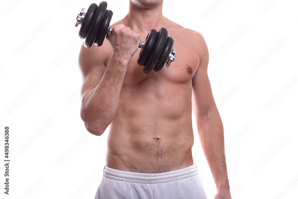 body of a young caucasian male athletic naked to the waist isolated on white background holding a heavy dumbbell