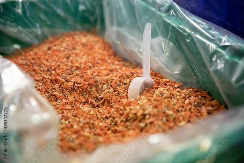 Close up of dried flakes in bulk bin