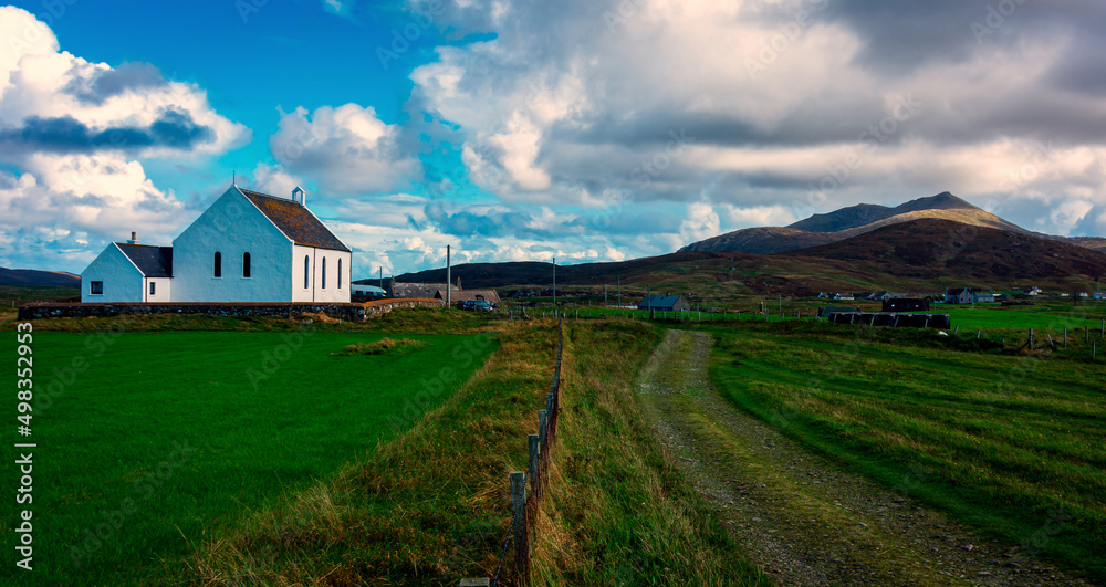 Church and hills, Howmore, South Uist, Outer Hebrides, Scotland, UK