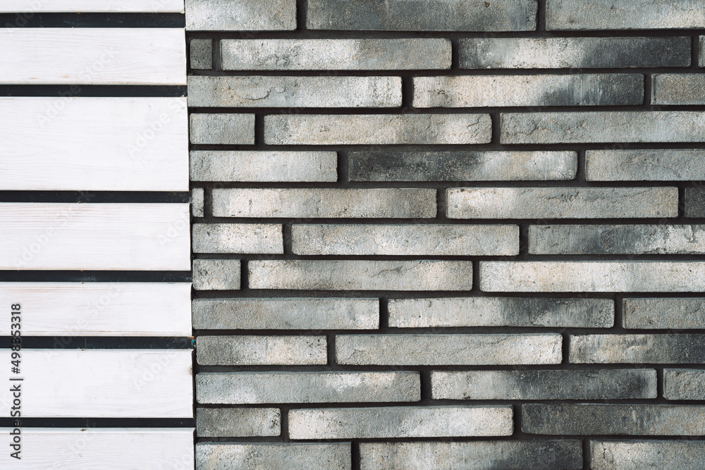 a combination of handmade gray decorative facade bricks and a white larch board for facade cladding a combination of handmade gray decorative facade bricks and a white larch board for facade cladding
