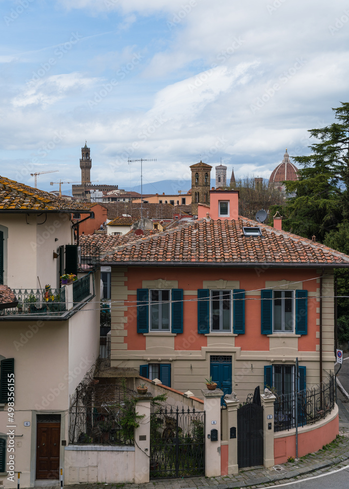facade and old roofs of houses in Florence, Italy 