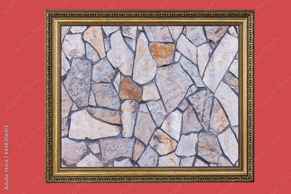 stone background of marble pieces of different sizes in a wooden frame on a colored background