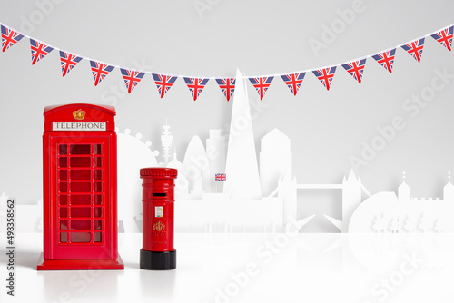 Fotografering Red model telephone ,post box,union jack jubilee bunting & London skyline concep
