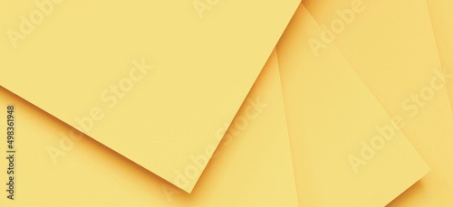 Abstract monochrome creative paper texture background. Minimal geometric pastel yellow color shapes and lines. Top view © vejaa