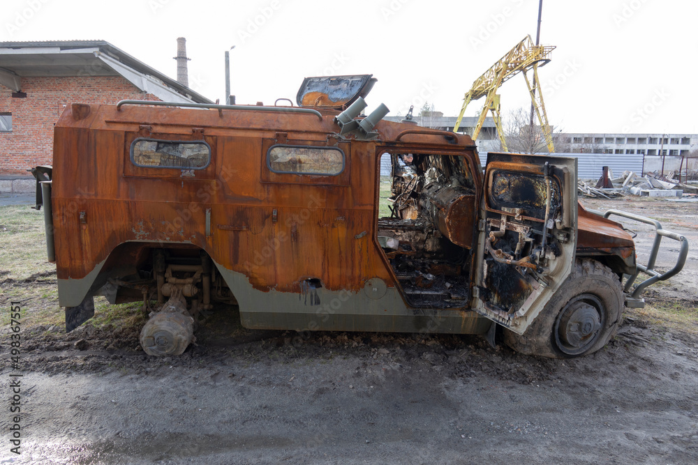 Damaged Russian military armored car tiger blown up and burnt.