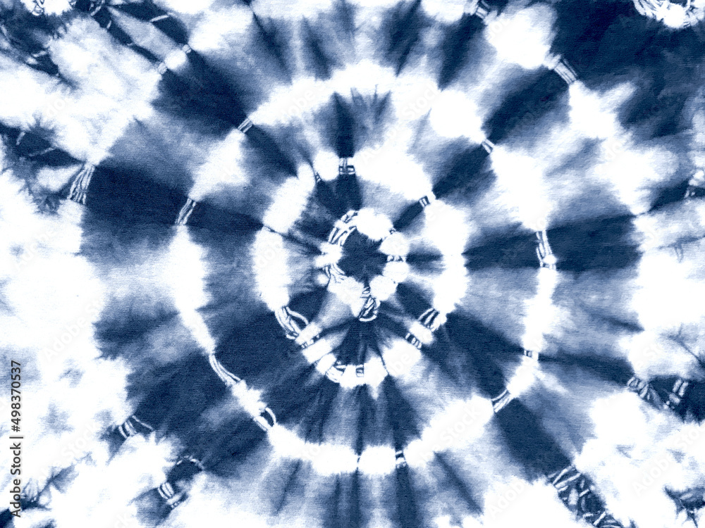 Fototapeta premium Tie dye shibori pattern. Abstract tie-dye technique hand dyed fabric.
