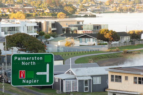 Taupo Lake Front with the turn off sign to Napier and Palmerston North