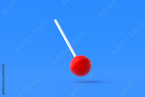 Lollypop on stick on blue background. Sweet candy. Confectionery goods. 3d render
