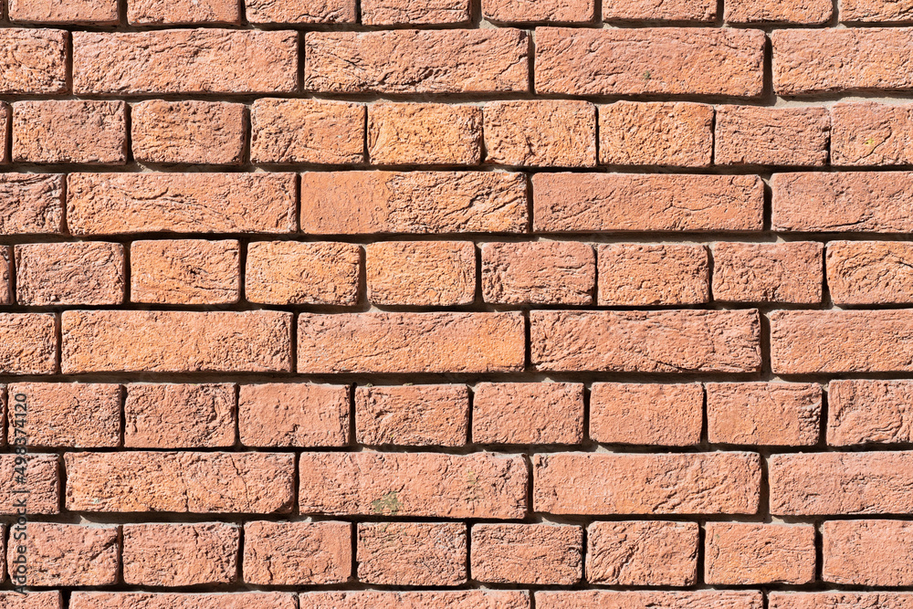 Old red brick wall, natural rough gritty texture. For natural background Old red brick wall, natural rough gritty texture. For natural background