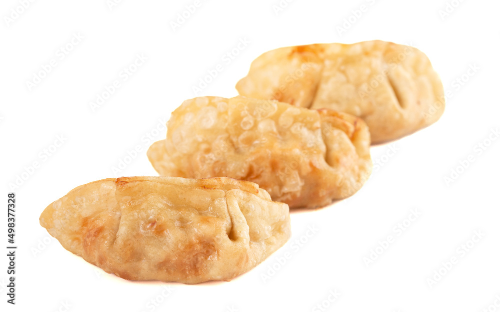 Three Potsticker Dumplings Isolated on a White Background Three Potsticker Dumplings Isolated on a White Background