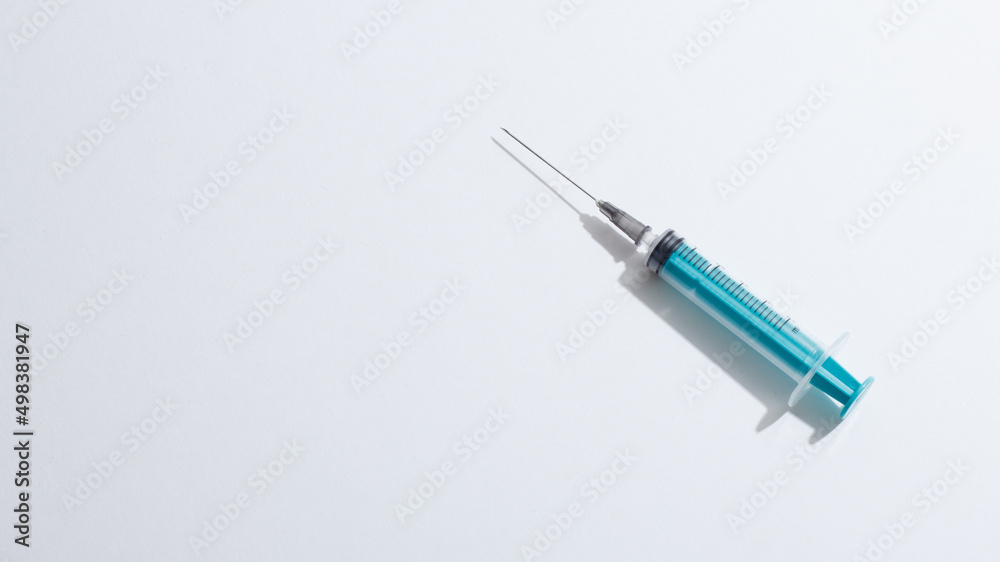 medical disposable plastic syringe for injection in the hospital isolated on a white background medical disposable plastic syringe for injection in the hospital isolated on a white background