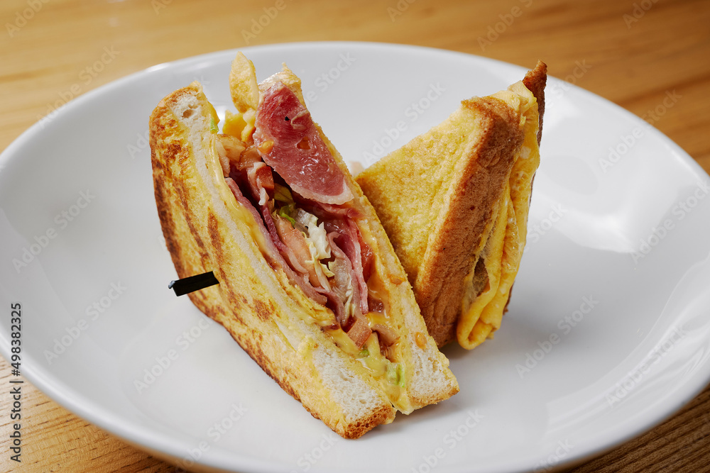 fried sandwich with meat and vegetables fried sandwich with meat and vegetables