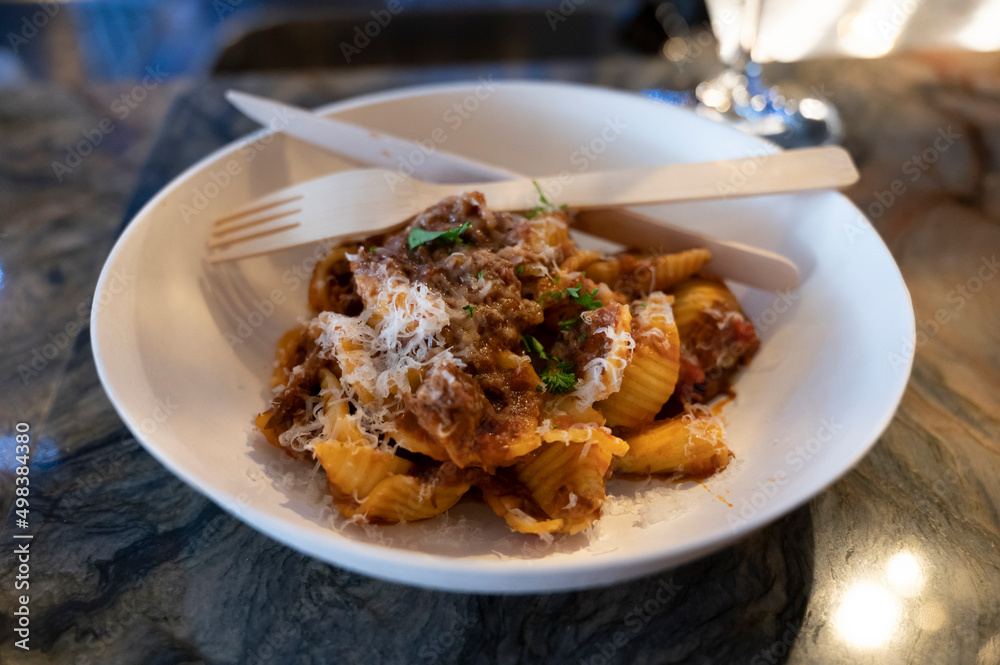 Italian street food, pasta with meat al ragu bolognese Italian street food, pasta with meat al ragu bolognese