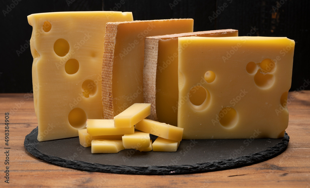 Swiss cheese collection, emmentaler with holes, gruyere, appenzeller ...
