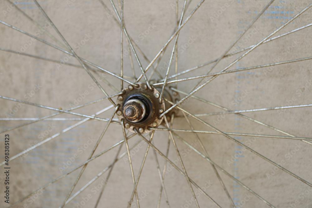 element of an old aluminum bicycle rim with spokes