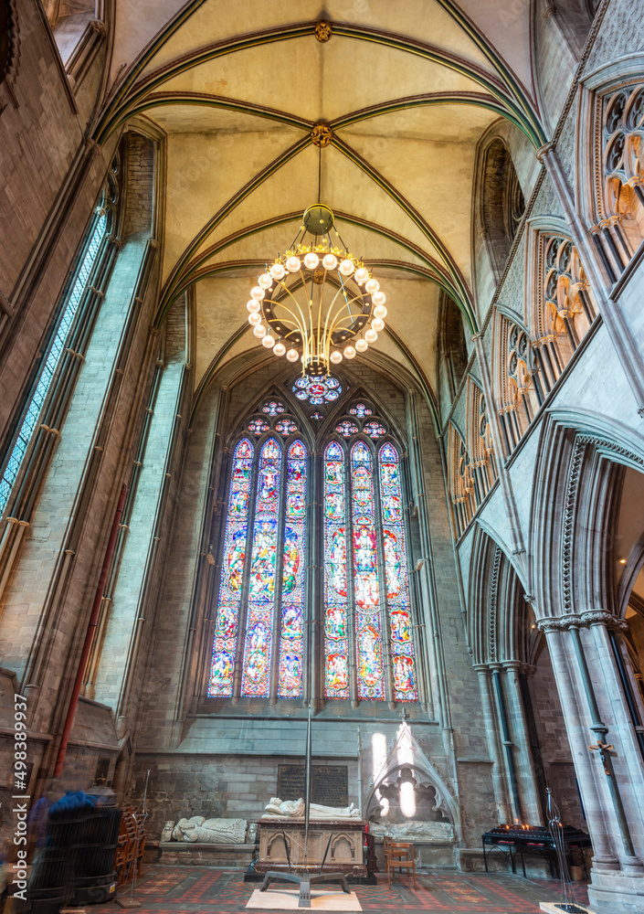 Hereford Cathedral,stained glass window and suspended illuminated lighting,interior,Herefordshire,England,UK.
