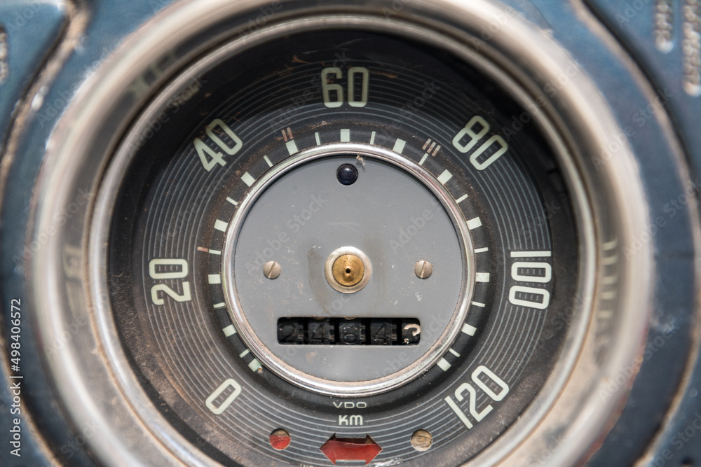 Details of a speedometer of an old vintage car being repaired.