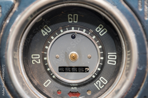 Details of a speedometer of an old vintage car being repaired.