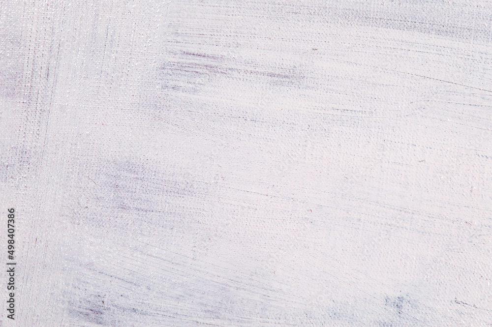 Obraz premium abstract light creative background - rough linen canvas unevenly covered with white primer. Toning, blur. Temporary object.