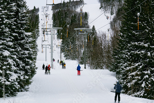 ski lifts in scandinavian resort. ski resort, slope, ski lift with snow, Lapland. winter skiing resort photo