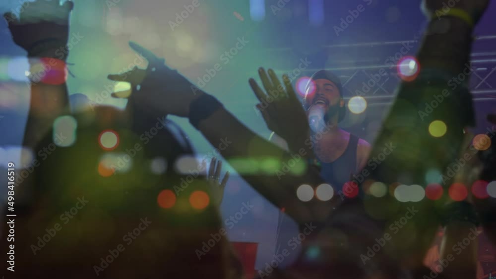 Animation of blurred road traffic over diverse people dancing at concert Animation of blurred road traffic over diverse people dancing at concert