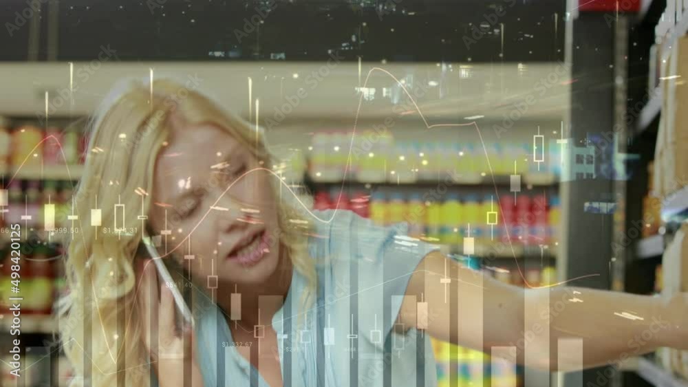 Animation of data processing over smiling caucasian woman talking on smartphone in shop Animation of data processing over smiling caucasian woman talking on smartphone in shop
