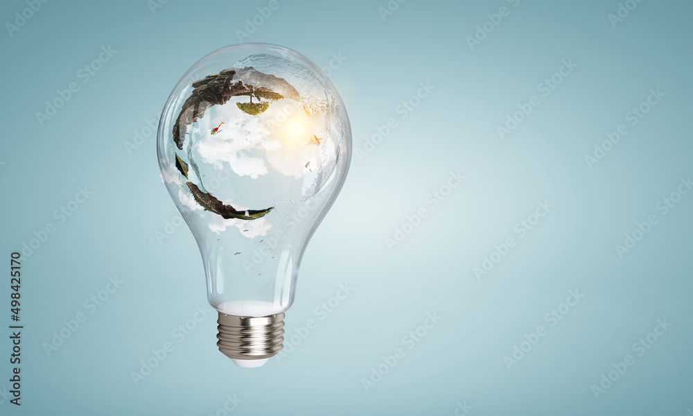 Green landscape inside light bulb Green landscape inside light bulb