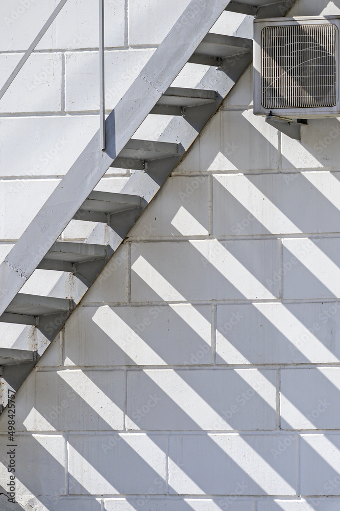 Fire escape on the background of the facade of the building Fire escape on the background of the facade of the building