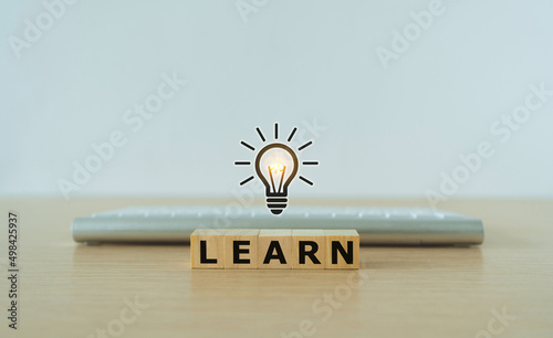 Light bulb with LEARN. Success idea business learning and knowledge