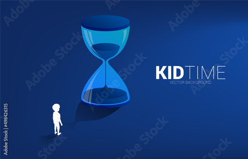 Silhouette of boy standing with sand clock. Concept for kid and children time.
