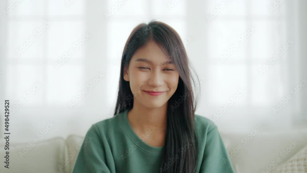 Portrait smiling asian young woman looking to camera. Facial expression happy Portrait smiling asian young woman looking to camera. Facial expression happy