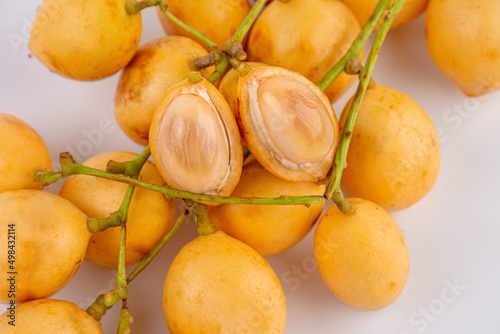 Thai fruit. Fresh ripe mafai with sweet and sour on white background.Close-up photo