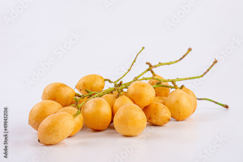 Thai fruit. Fresh ripe mafai with sweet and sour on white background.Close-up