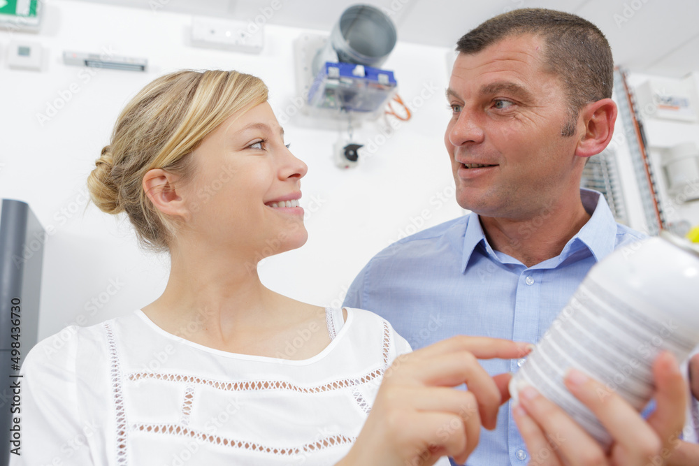 Fototapeta premium woman holding small pressurize container