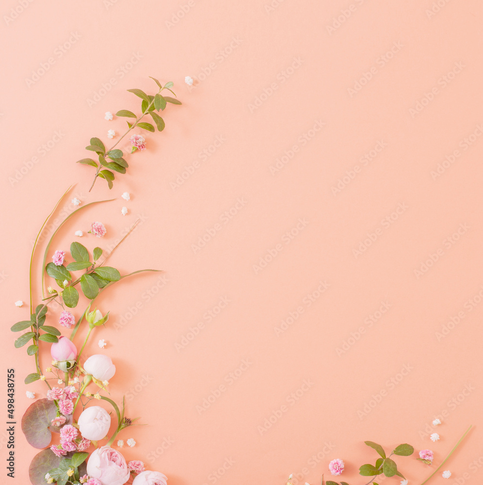 Fototapeta premium pink roses with leaves on paper background