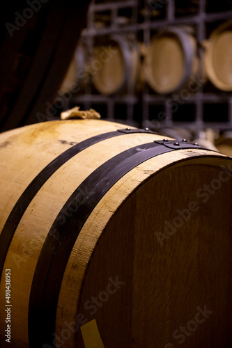 Production of sweet cassis creme liquor and strong marc from ripe black currant berries, distillation and maturation in wooden barrels. Burgundy, France photo
