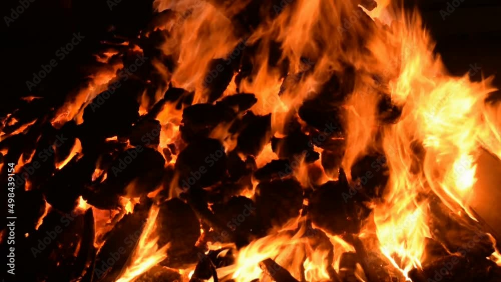 Fire flames on black background, Blaze fire flame texture background, Beautifully, the fire is burning, Fire flames with wood and cow dung bonfire Fire flames on black background, Blaze fire flame texture background, Beautifully, the fire is burning, Fire flames with wood and cow dung bonfire